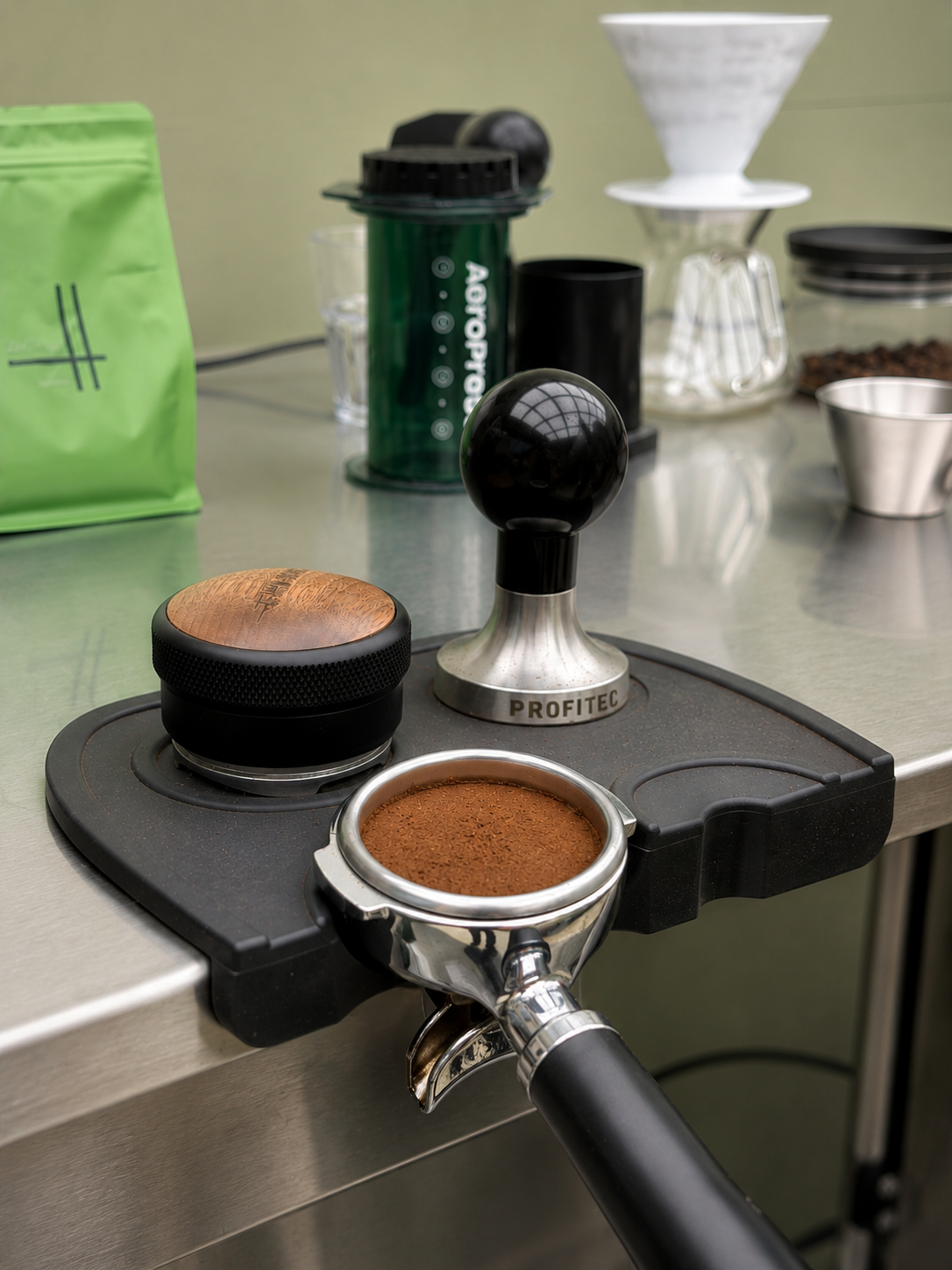 Freshly roasted ground coffee in a porta filter
